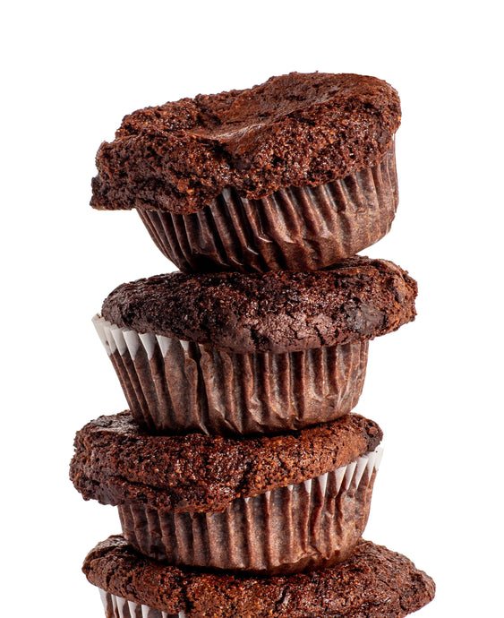 Breakfast Brownies stacked on a white background