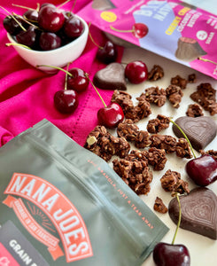 Nana Joe's granola with cherries and BTR Nation chocolate hearts on a pink cloth