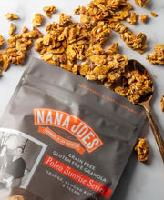 Load image into Gallery viewer, Nana Joes Granola Paleo Sunrise orange blend with a copper spoon
