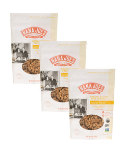 Three packages of Nana Joes Granola organic gluten-free granola on a white background