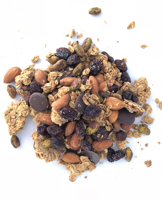 a little pile of Tony's Trail Mix on a white table